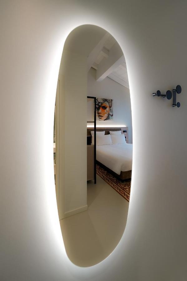 Bergamo Inn 21 Dış mekan fotoğraf A room at the hotel